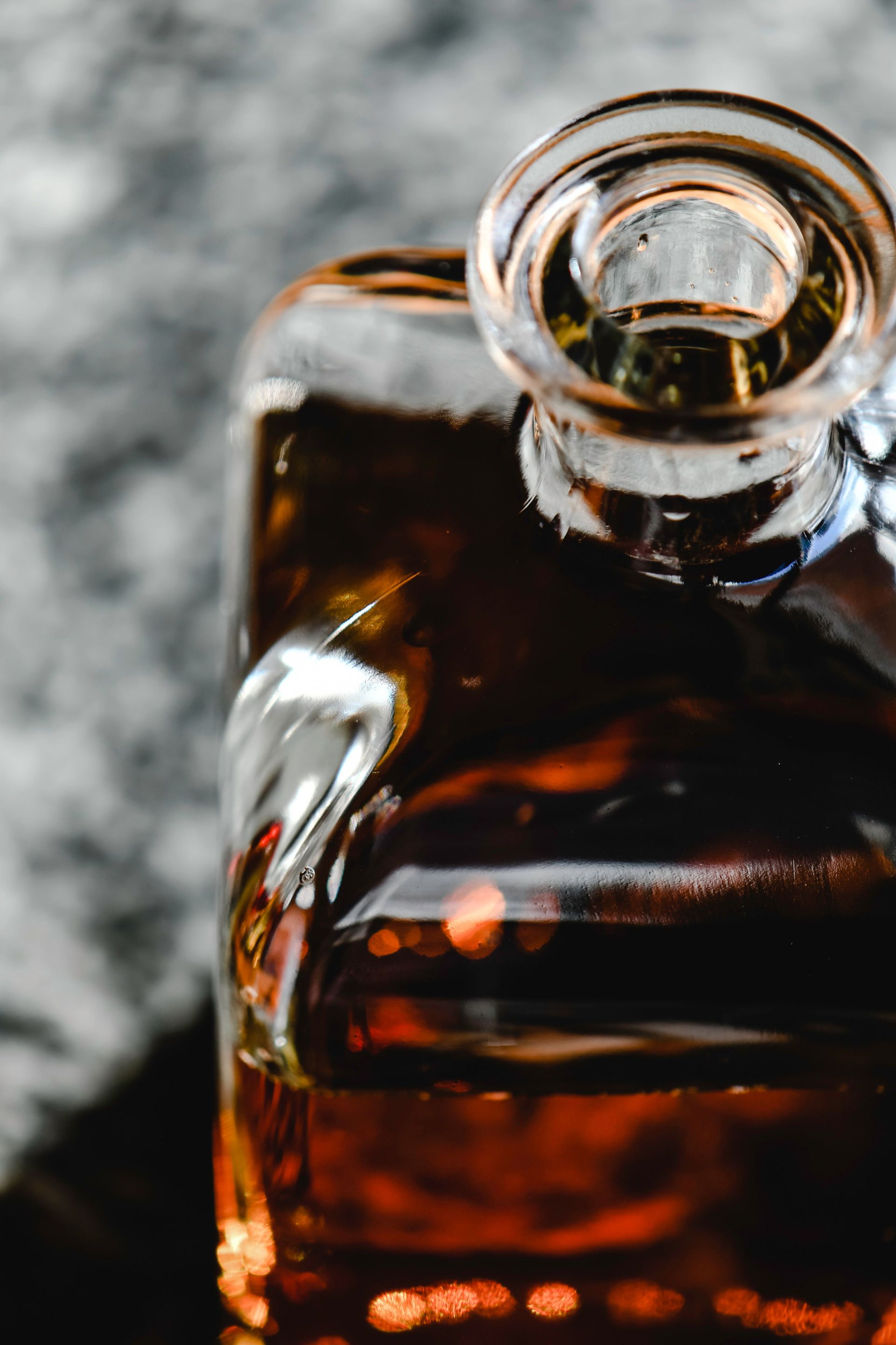Close-up view of a whiskey bottle showcasing its elegant design and color.